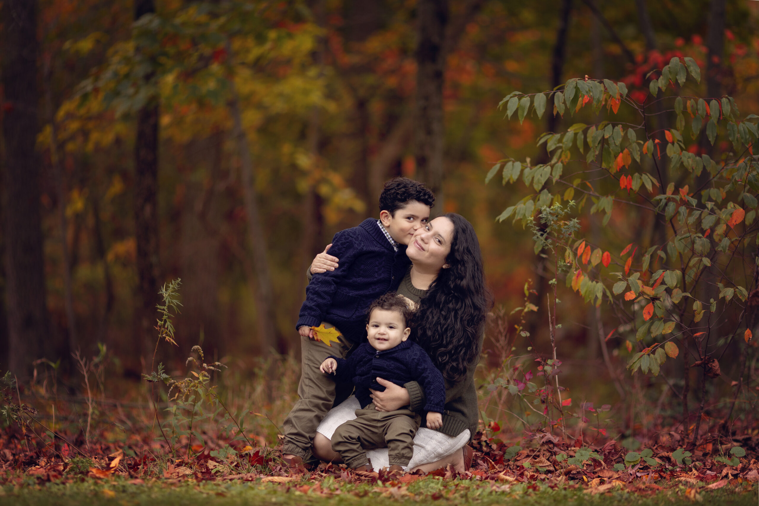 Mom with her two small boys taking family photos in a central NJ park.