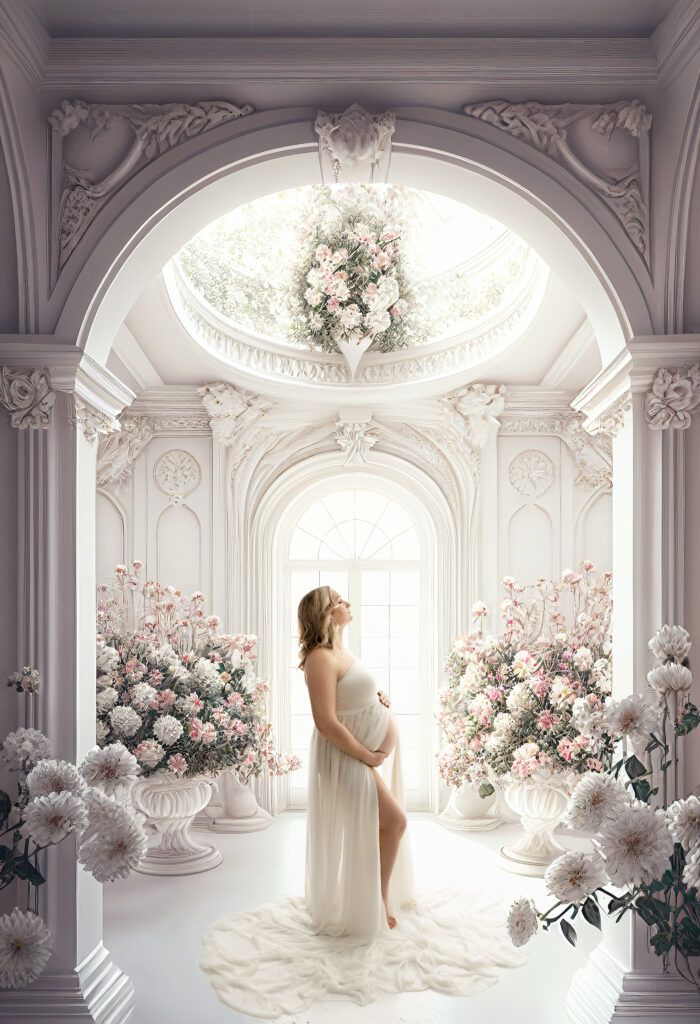 Elegant mother to be in a ball room with flowers around